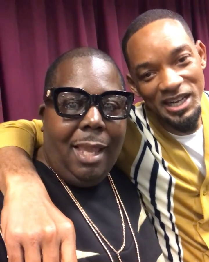 Will Smith and Bilaal Salaam smiling at the camera.