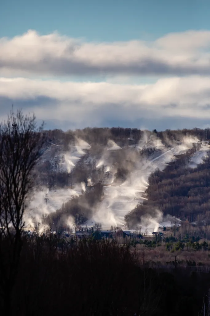 Snow cannons making snow on Granite Peak Ski Hill in Rib Mountain, Wausau, Wisconsin.
