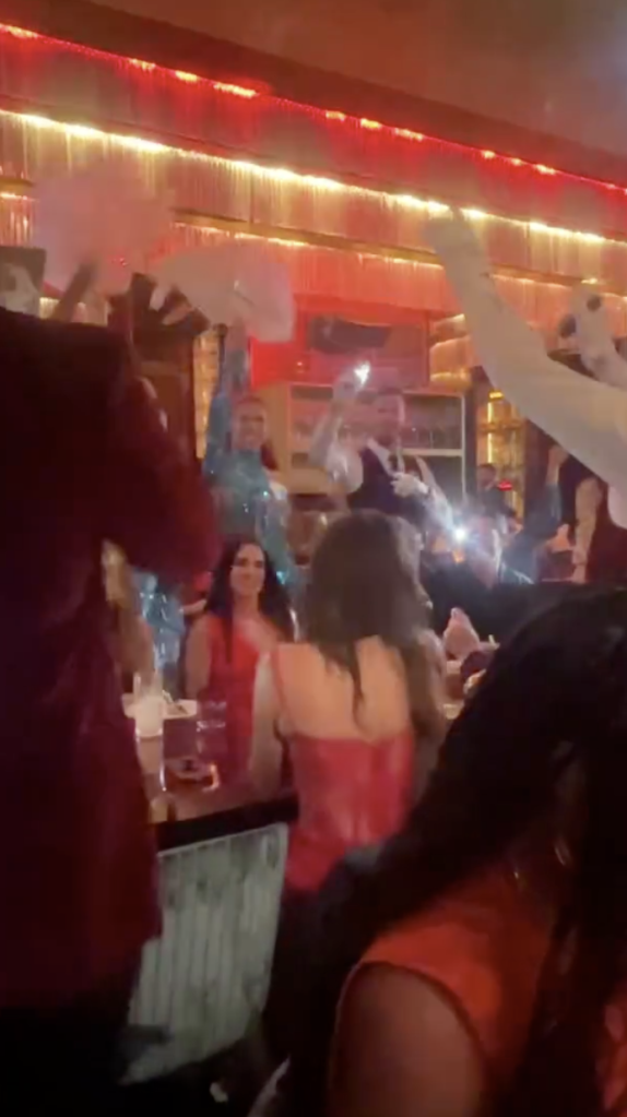 Sofia Vergara with a group of people dancing in a restaurant in Miami.