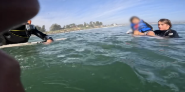 Teen surfers rescue family from cold water after their boat overturns