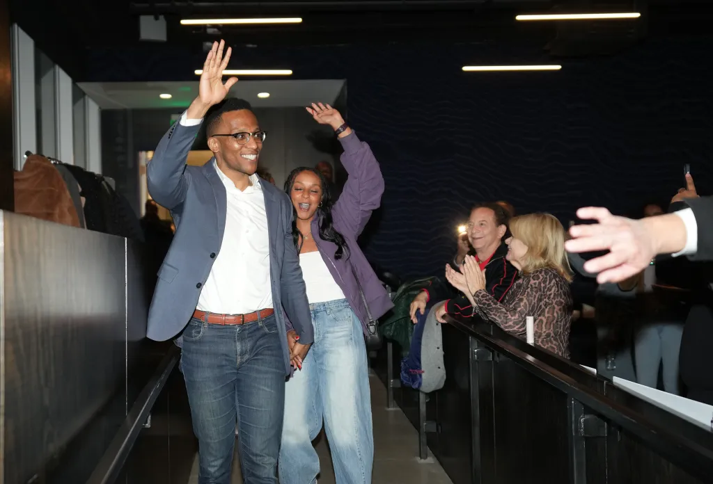 Christian Menefee arrives at his watch party with his wife Kaitlyn on Election Day in Houston, Texas, on Jan. 31, 2026.