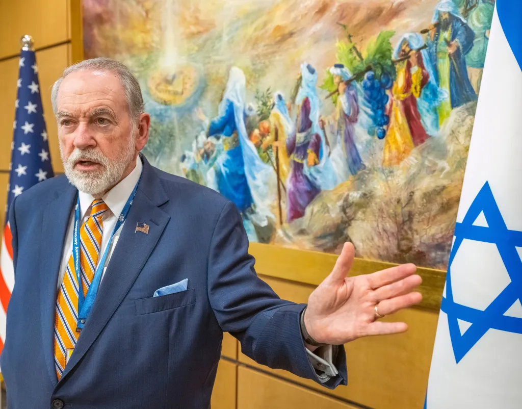 U.S. Ambassador to Israel Mike Huckabee speaking in his Jerusalem office.