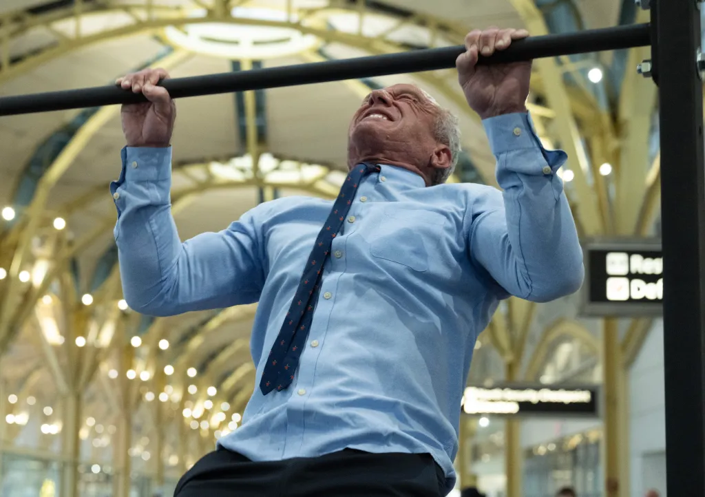 Robert F. Kennedy, Jr. does a pull-up at Ronald Reagan Washington National Airport.