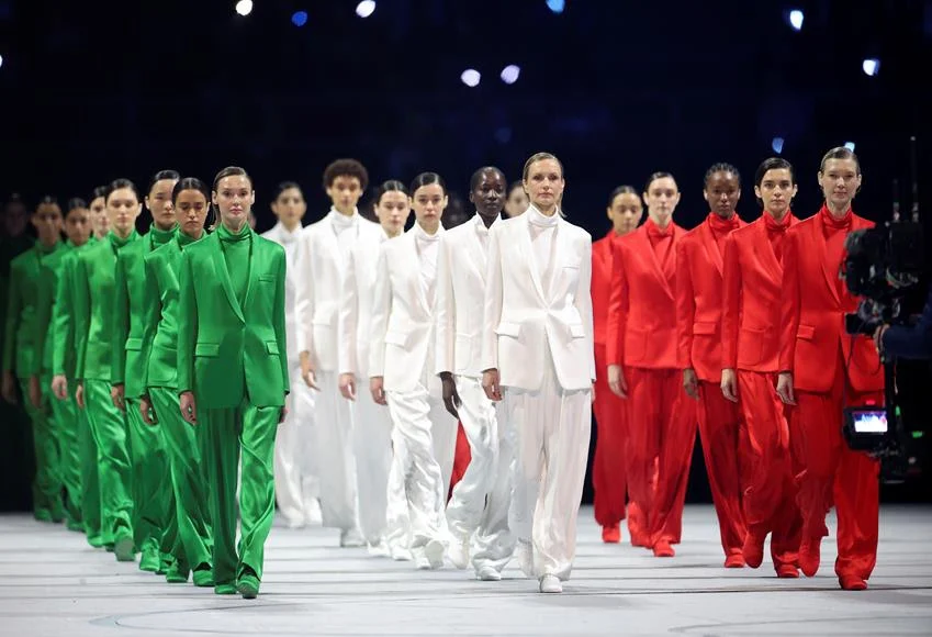 Models walk the runway wearing creations designed by Giorgio Armani during the opening ceremony of the Milano Cortina 2026 Olympic Winter Games at the San Siro Stadium in Milan, Italy, Feb. 6, 2026. Source: Getty 