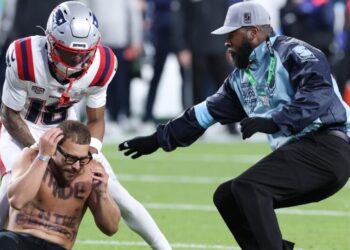 So-called streakers arrested at Super Bowl reveal identities on social media