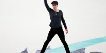 Maxim Naumov shines in Olympics spotlight on strength of parents