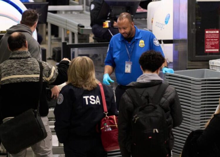 TSA agents are working without pay due to another shutdown