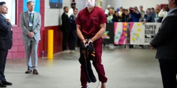Patriots’ Mack Hollins arrived at Super Bowl dressed as a prisoner. Here’s why that’s not surprising