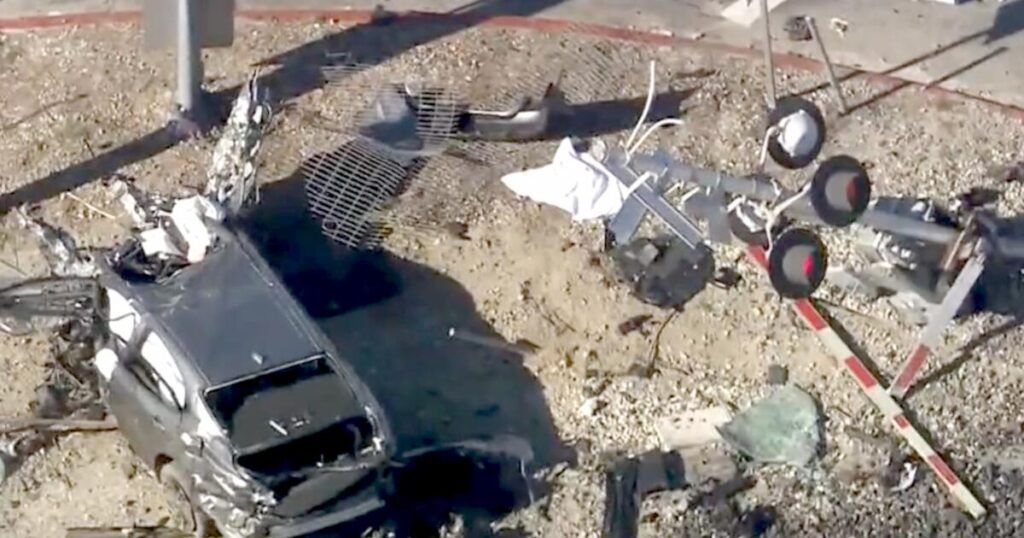 Metrolink train slams into car in Glendale, killing 1 person, hospitalizing 2