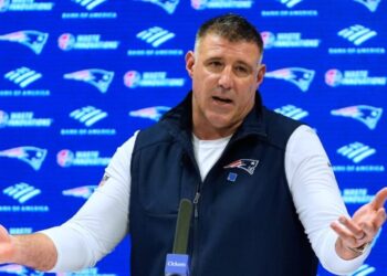 Has anyone ever won a Super Bowl as a player and a head coach?