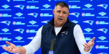 Has anyone ever won a Super Bowl as a player and a head coach?