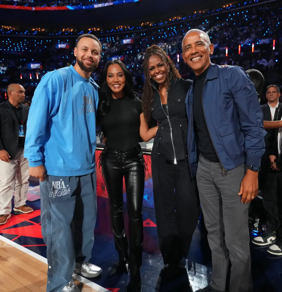 Former President Barack Obama and Michelle Obama pose with Stephen Curry and Ayesha Curry during the 75th NBA All-Star Game.