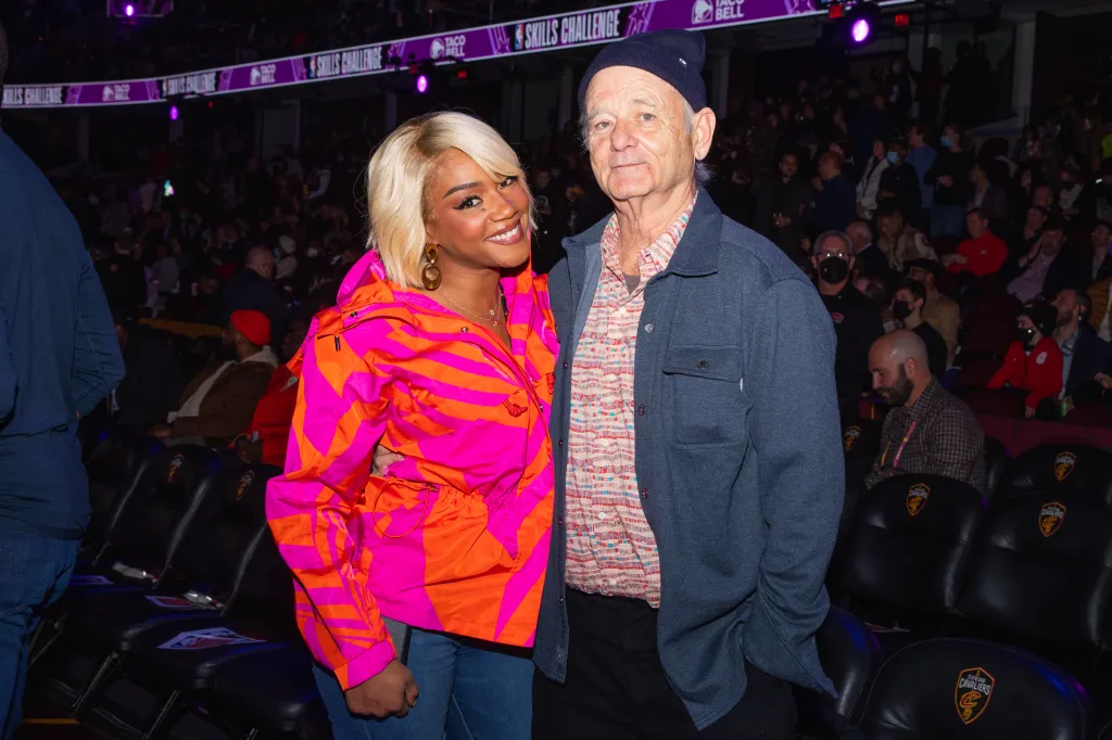 Tiffany Haddish and Bill Murray posing for a photo.