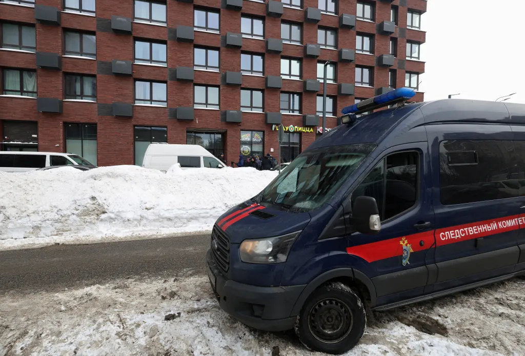 A van belonging to the Russian Investigative Committee is parked outside a residential building where the assassination attempt on Russian Lieutenant General Vladimir Alexeyev took place in Moscow, Russia on February 6, 2026. 