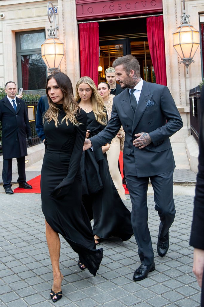 Victoria and David Beckham leaving a hotel during Paris Fashion Week.