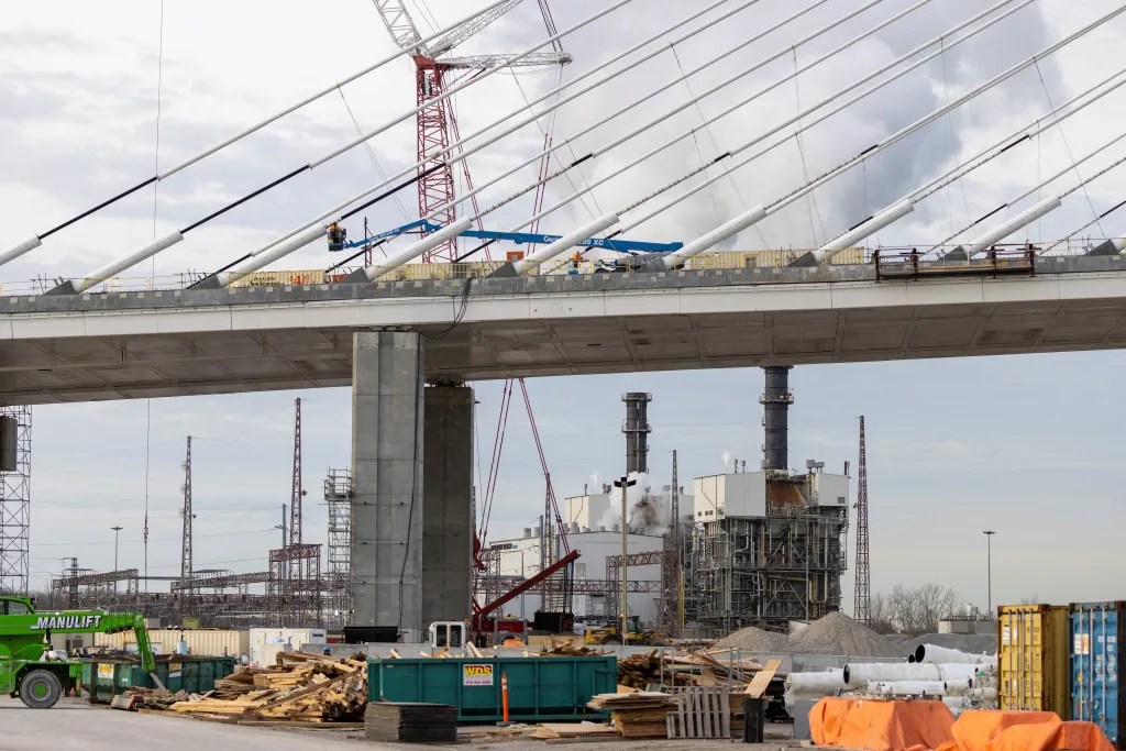 A view of the still-under-construction Gordie Howe International Bridge and in the background Atura Power - Brighton Beach generating station, in Windsor, Ontario, Canada, February 5, 2025.