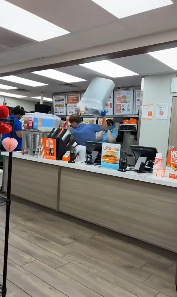 A Texas Whataburger manager clobbered an out-of-control customer with a trash can after the man allegedly returned drunk and attacked an employee.
