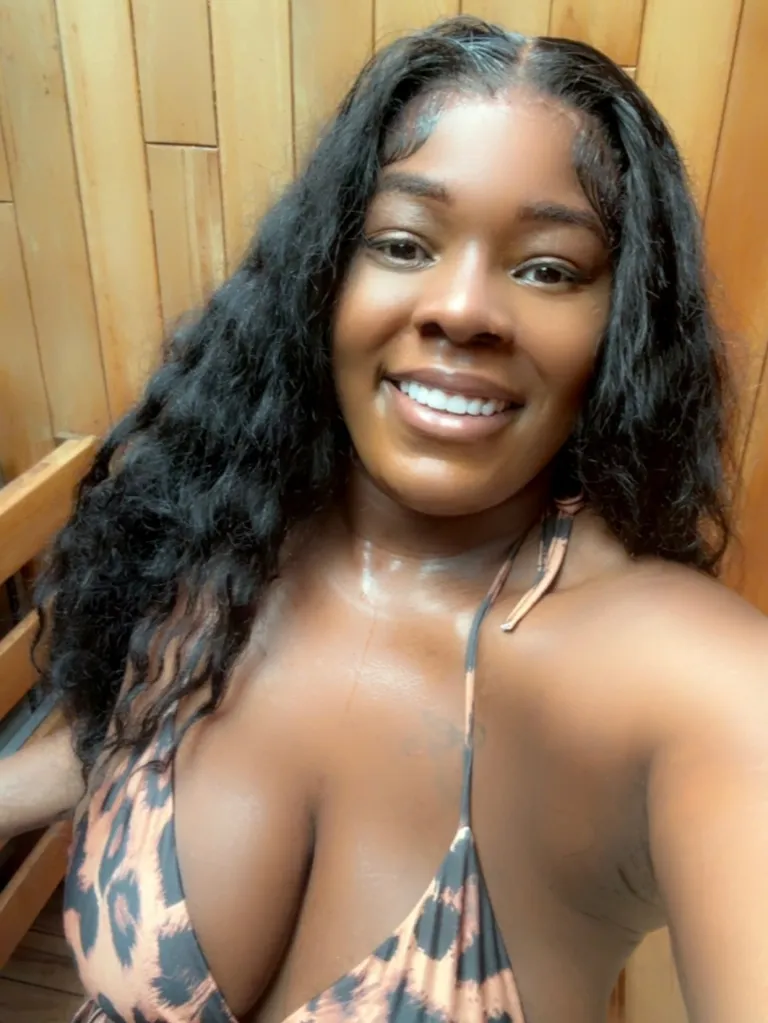 Tronderrica James smiling at the camera.