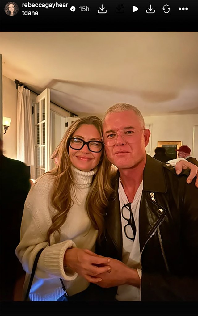 Rebecca Gayheart and Eric Dane smiling, with Eric Dane's arm around Rebecca.