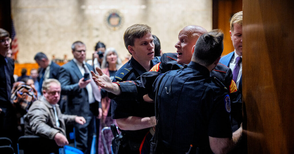 Senator Helps Officers Forcibly Remove Protesting Veteran From Hearing