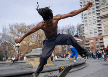 A Warm Day Arrives and New Yorkers Rush Into Spring’s Embrace