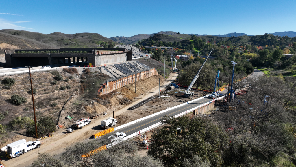 Aerial view of the Wallis Annenberg Wildlife Crossing construction over the 101 Freeway in Agoura Hills.