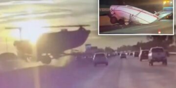 Terrifying moment runaway boat careens across traffic on major LA freeway