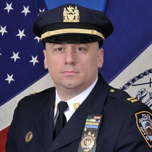 Headshot of a police officer in uniform.