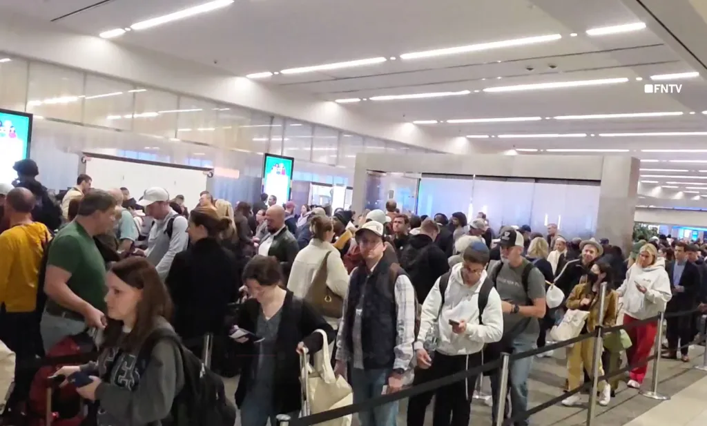 Massive crowds in a TSA PreCheck line at LaGuardia Airport.