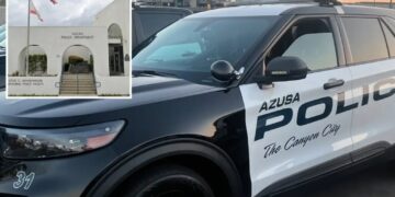 Dead man found inside police car may have been there for days