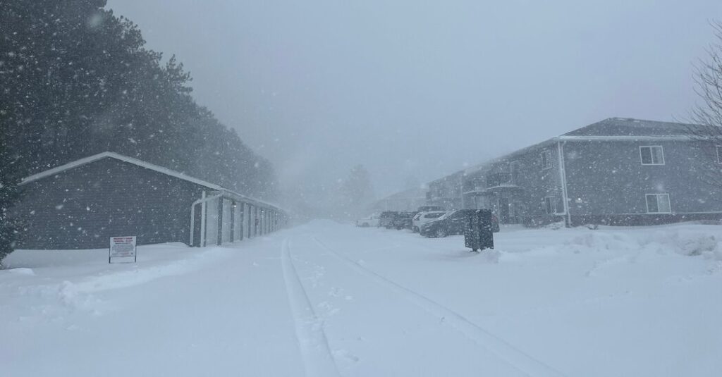 Powerful Winter Storm Disrupts Travel and Knocks Out Power in the Upper Midwest