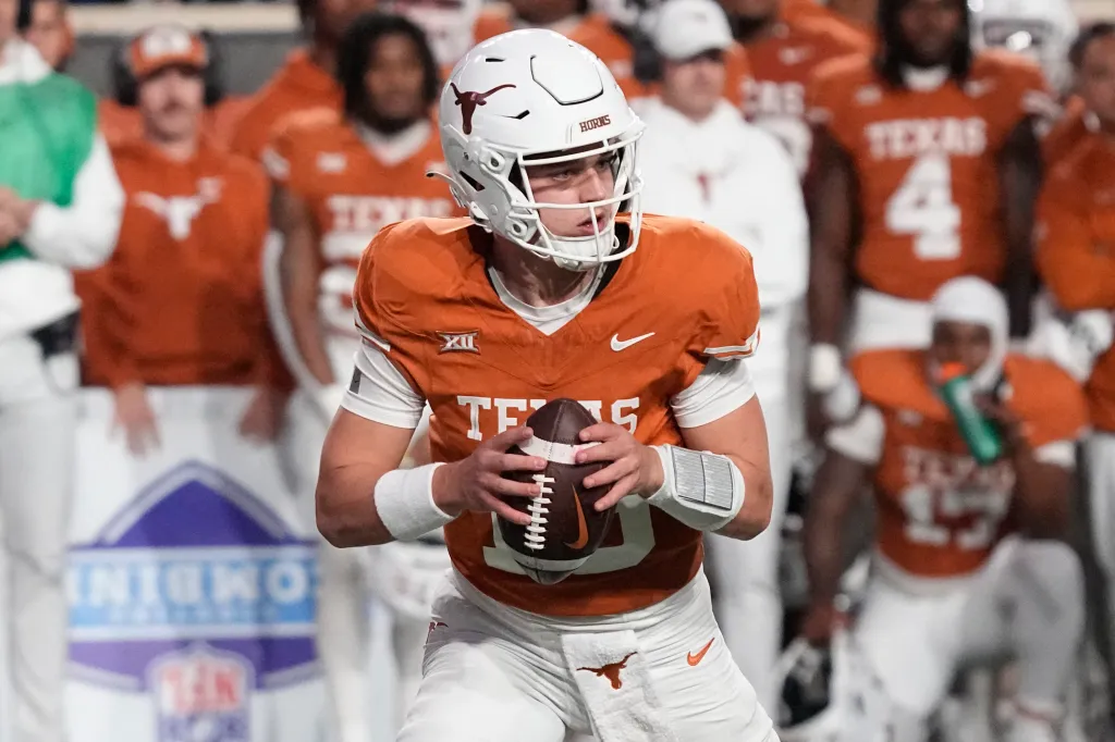 Texas Longhorns quarterback Arch Manning (16) looks to pass the ball during the second half against the Texas Tech Red Raiders.