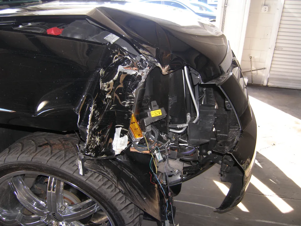 Damage to the front right side of Tiger Woods's SUV.