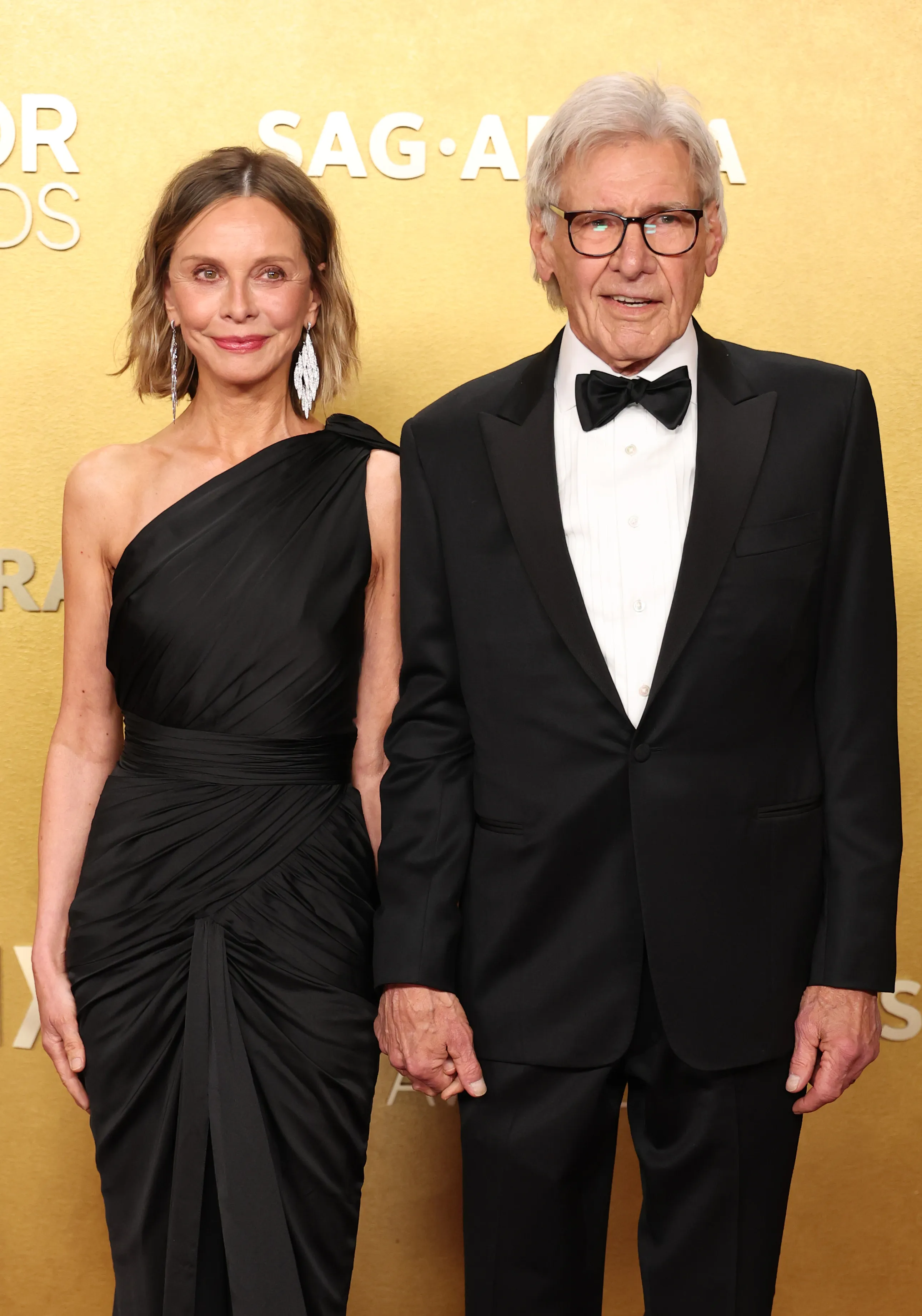 Calista Flockhart and Harrison Ford attending the 32nd Annual Actor Awards.