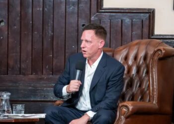 Peter Thiel warned AI is coming for ‘math people before word people.’ Banks have already said smaller headcounts are possible