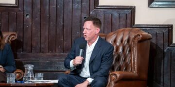 Peter Thiel warned AI is coming for ‘math people before word people.’ Banks have already said smaller headcounts are possible