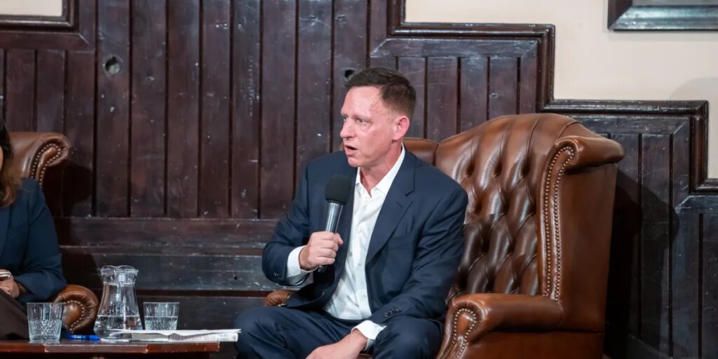 Peter Thiel warned AI is coming for ‘math people before word people.’ Banks have already said smaller headcounts are possible
