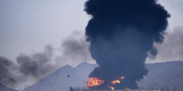 Tehran threatens Middle East’s busiest port as Iran war enters its third week