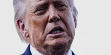 MAGA goes ballistic as Trump wades into conservative feud — on a controversial side