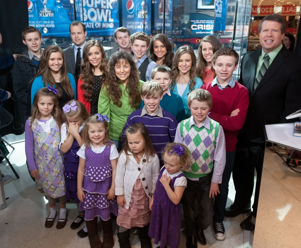The Duggar family poses together at the Extra studio in New York City.