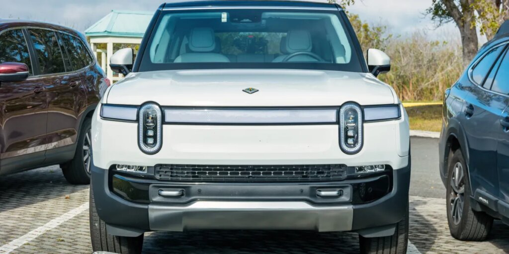 Uber will operate its own robotaxis again—this time with Rivian’s not‑yet‑built EVs