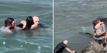 Dramatic video shows hero surf instructor rescue drowning girl