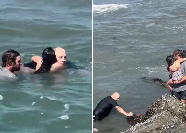 Dramatic video shows hero surf instructor rescue drowning girl
