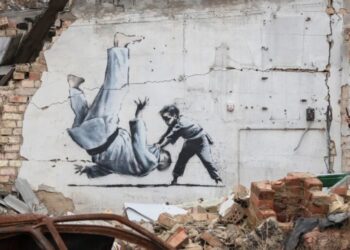 Banksy may have been identified, but his mystery has long been part of his art’s value, and a fan says it’s like finding out Santa Claus isn’t real