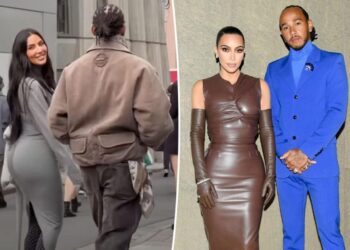 Kim Kardashian smiles at fans while strolling arm in arm with Lewis Hamilton in Tokyo
