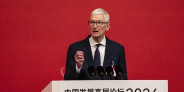 Apple CEO praises China partners as Beijing applies pressure