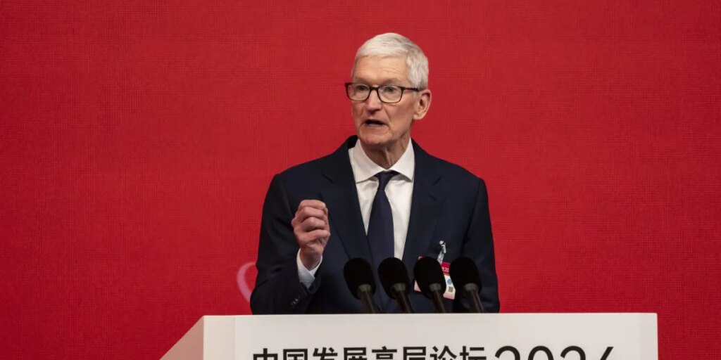 Apple CEO praises China partners as Beijing applies pressure