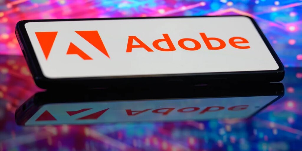 Adobe’s CFO is using AI to answer 300,000 emails, cut contract review in half — and make sure finance never slows the company down