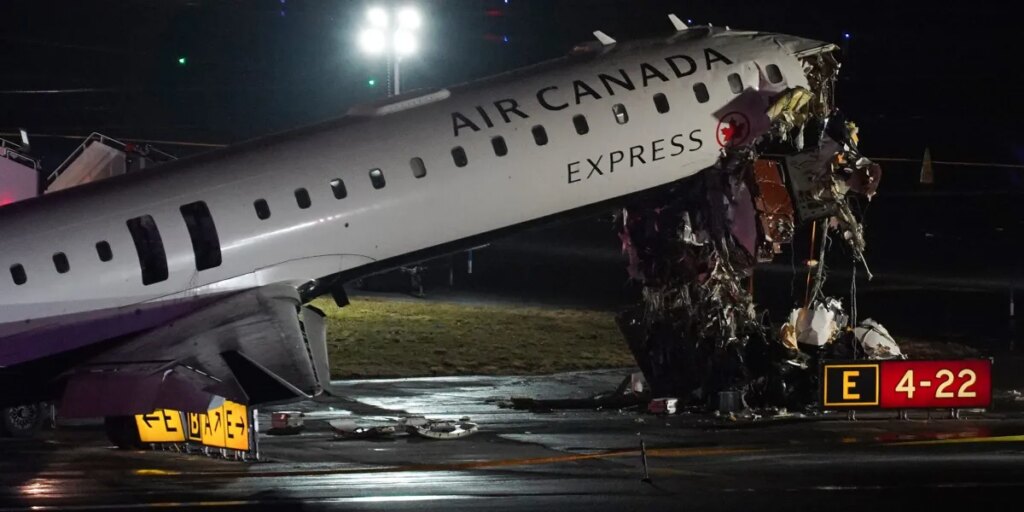 Two people dead after an Air Canada jet struck a firetruck on the LaGuardia Airport runway