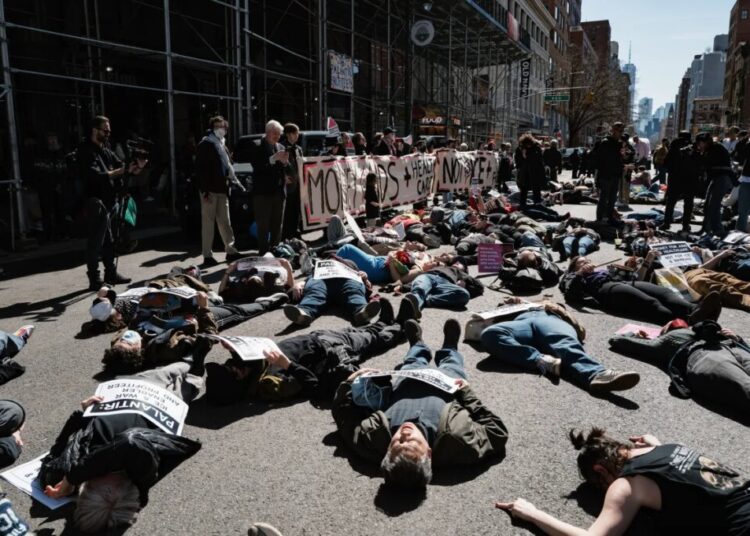 Protesters Stage Unsettling Demonstration in Front of Palantir’s Office